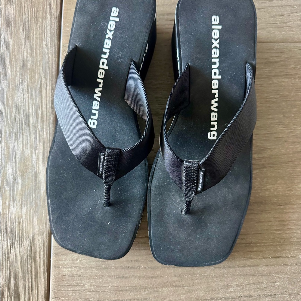 Alexander Wang Wedge Flip Flops in black with logo-print